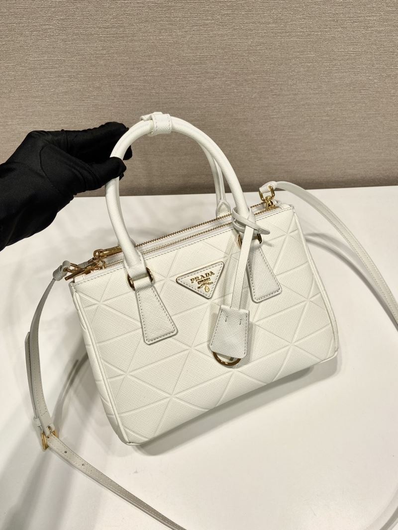 Pra*a top handle bags